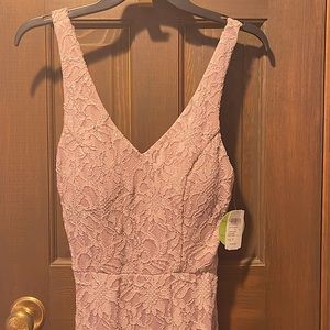 NWT size 7 lavender formal gown with lace, sparkle and left leg slit